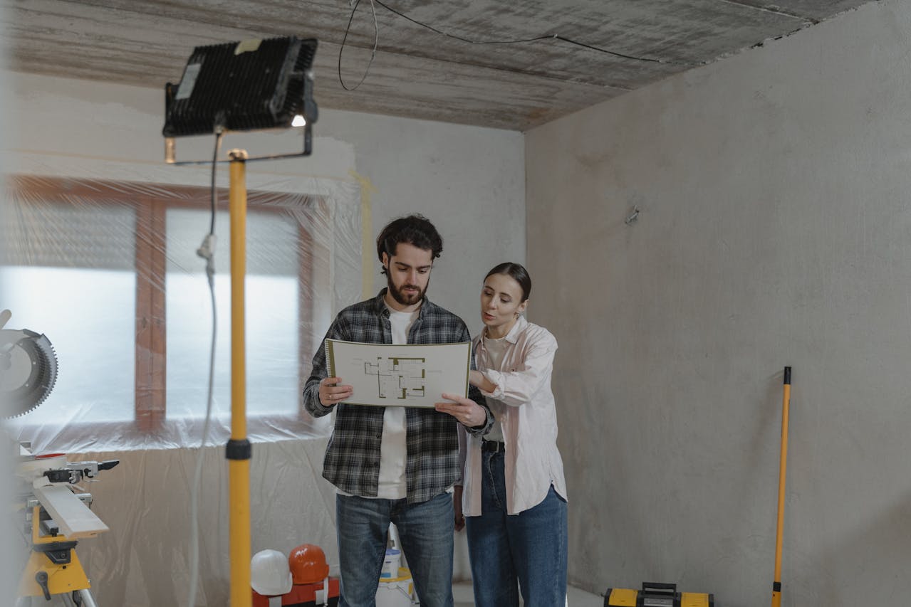 Couple looking at a blueprint